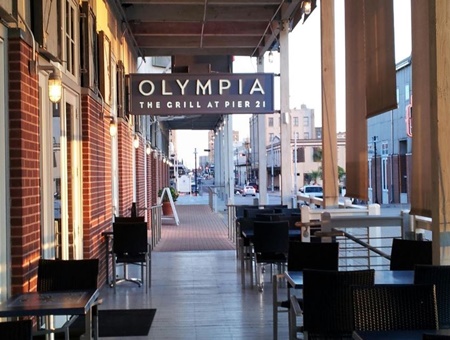 $$ Olympia the Grill at Pier 21 - Greek, Seafood; this is a sophisticated dining option with harborfront seating serving grilled seafood and Greek specialties. The owners are first-generation Greek-Americans, born and raised in Galveston, Texas.